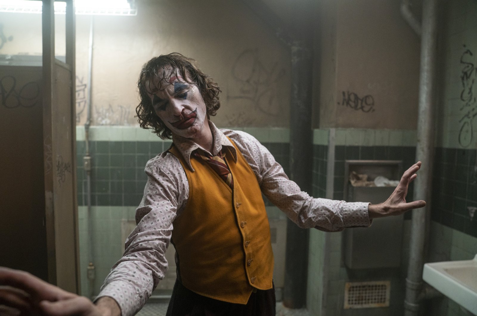 This image released by Warner Bros. Pictures shows Joaquin Phoenix in a scene from "Joker." (AP Photo)