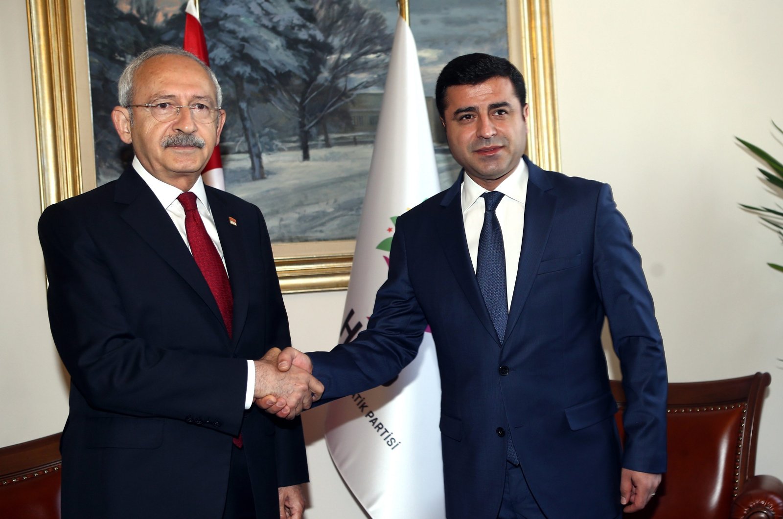 Kemal Kılıçdaroğlu (L) and Selahattin Demirtaş, then-chairs of the Republican People's Party (CHP) and the now-defunct Peoples’ Democratic Party (HDP), respectively, shake hands during a "Gezi Solidarity" event, Istanbul, Türkiye, March 14, 2016. (Sabah File Photo)