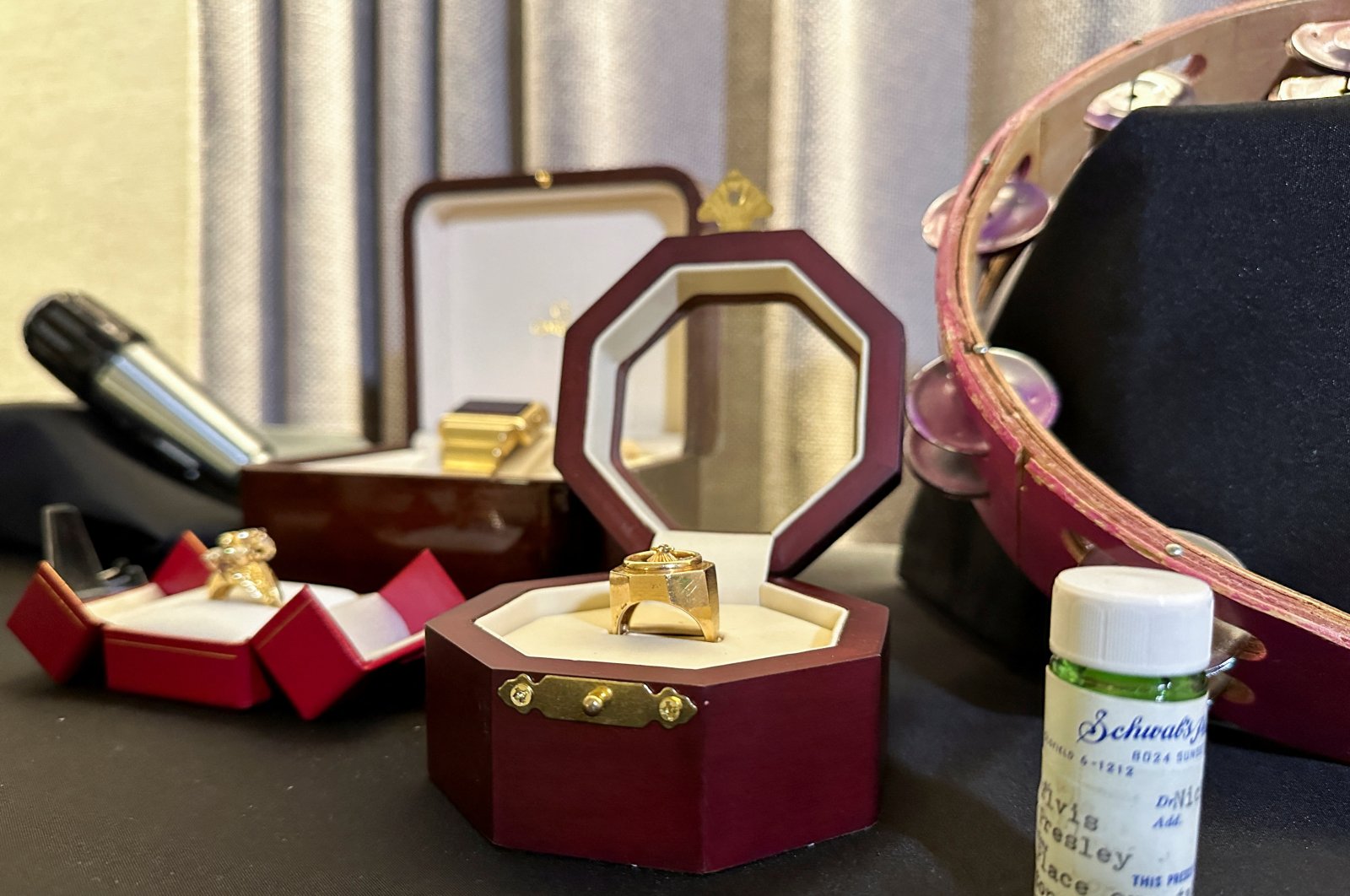 Elvis Presley's jewelry and pill bottle are displayed ahead of Artifacts of Hollywood & Music sale by GWS Auctions, New York City, New York, U.S. Aug. 26, 2024. (Reuters Photo)