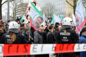 Police officers secure a demonstration of PKK terrorist sympathizers demanding the release of the PKK's imprisoned leader Abdullah Öcalan, Cologne, Germany, Feb. 17, 2024. (Reuters Photo)