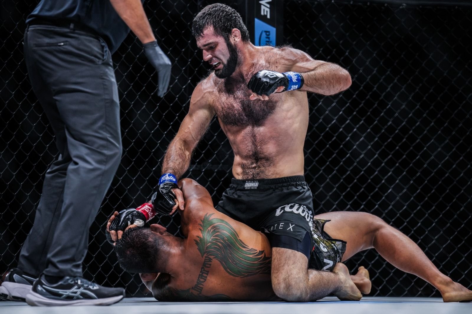 Turkish MMA fighter Shamil Erdoğan pounds on U.S.' Aung La N Sang at the ONE 168, Denver, U.S., Sept. 7, 2024. (Photo by Lara Badreddine)
