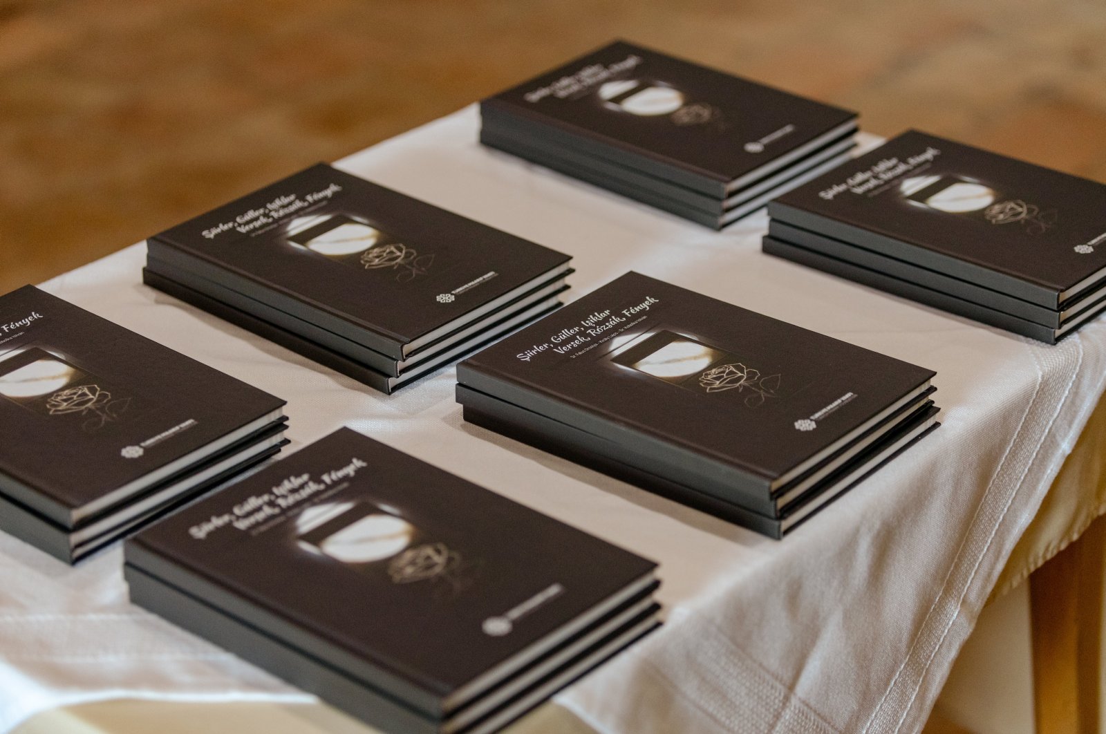The Turkish Maarif Foundation unveils the "Poems, Roses, Lights" book in a ceremony in Zigetvar, Hungary, Sept. 8, 2024. (AA Photo)