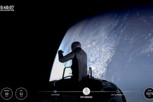 This still image taken from a SpaceX and Polaris broadcast shows U.S. fintech billionaire Jared Isaacman (EV1) peeking out to space from a hatch structure called "Skywalker" during the first private spacewalk performed by the crew of the SpaceX Polaris Dawn mission, Sept. 12, 2024. (AFP Photo)