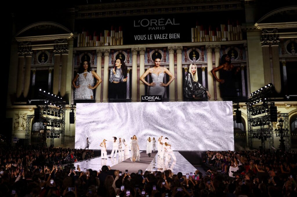 A model presents a creation during a public show named "Walk Your Worth" organized by L'Oreal near the Opera Garnier as part of Paris Fashion Week, Paris, France, Sept. 23, 2024. (Reuters Photo)