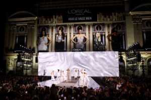 A model presents a creation during a public show named "Walk Your Worth" organized by L'Oreal near the Opera Garnier as part of Paris Fashion Week, Paris, France, Sept. 23, 2024. (Reuters Photo)