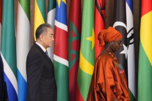China's Foreign Minister Wang Yi (L), and Senegal's Foreign Minister Yassine Fall arrive at the ministerial conference during the Forum on China-Africa Cooperation (FOCAC) at the Diaoyutai State Guesthouse, Beijing, China, Sept. 3, 2024. (AP Photo)