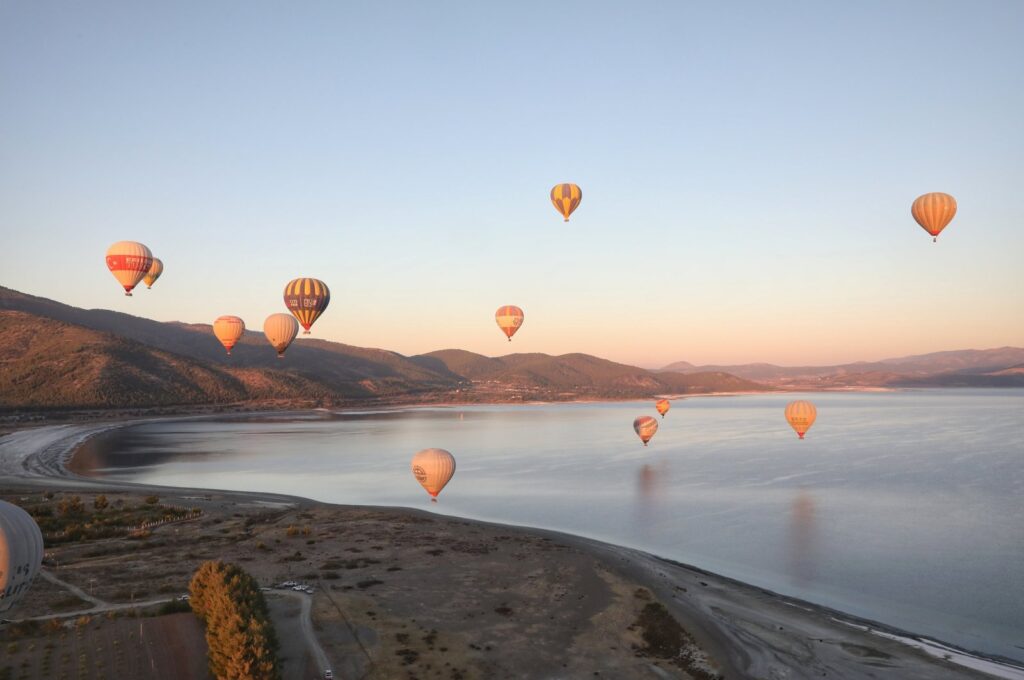 Balloons fly over Lake Salda as part of the "Tourism Century" project, Burdur, southern Türkiye, Oct. 3, 2024. (AA Photo)