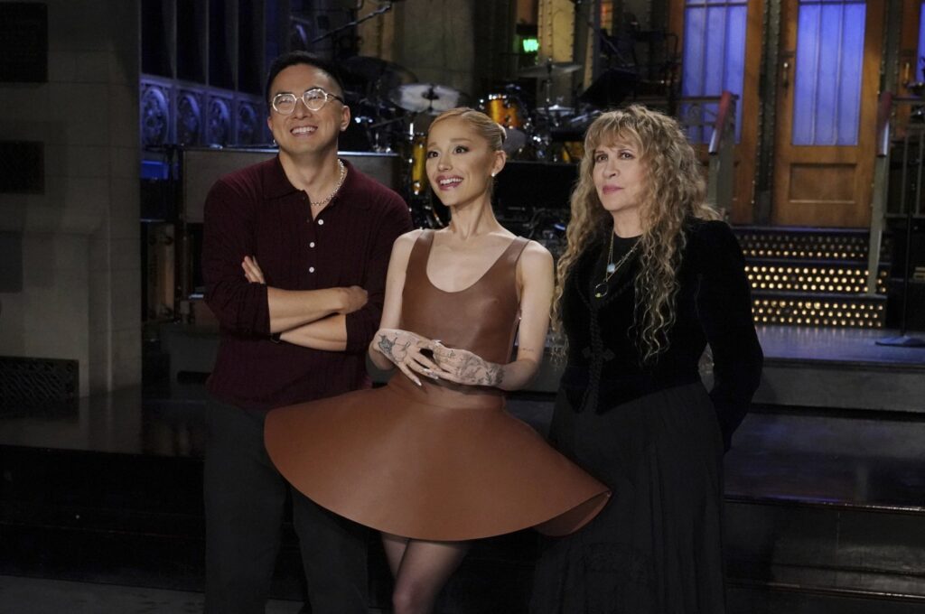 Cast member Bowen Yang (L), host Ariana Grande (C) and musical guest Stevie Nicks during promos for the upcoming "Saturday Night Live" broadcast in New York, U.S., Oct. 10, 2024. (NBC via AP Photo)