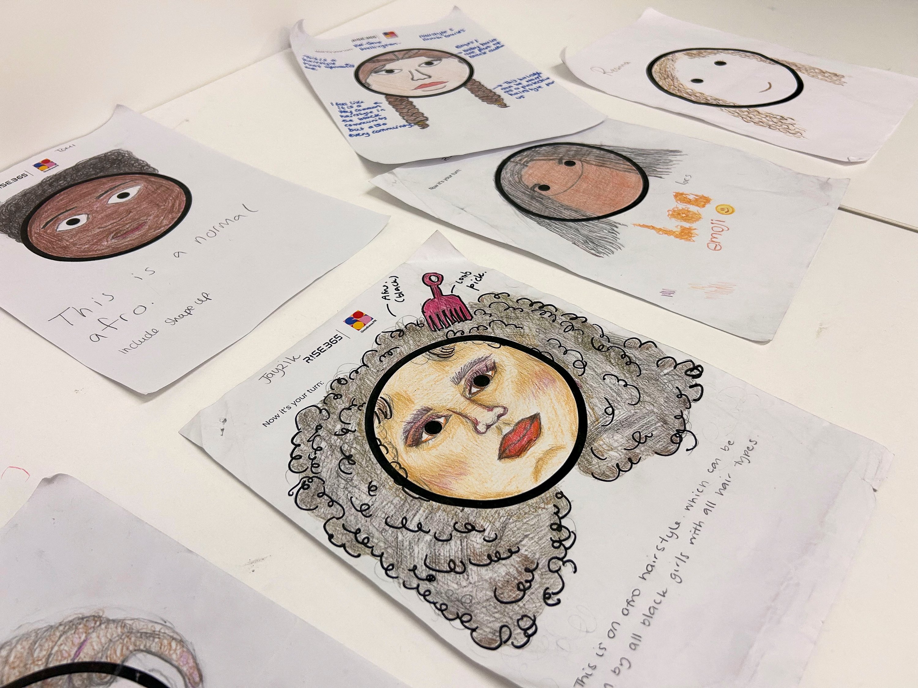 351945 Drawings of Afro hair emojis are seen at the Concorde Youth Club, Hackney, east London, U.K., Oct. 21, 2024. (Reuters Photo)