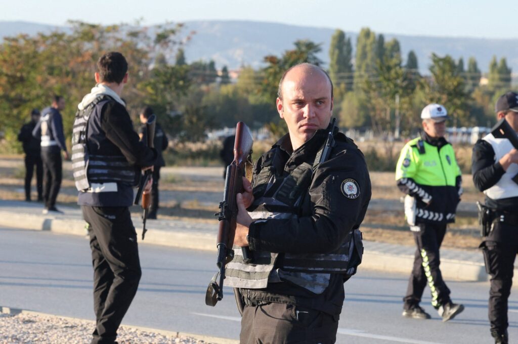 Police and private security guards secure the entrance of the headquarters of Türkiye's aerospace company TAI, after the terrorist attack, near Kahramankazan, Ankara, Türkiye, Oct. 23, 2024. (Reuters Photo)
