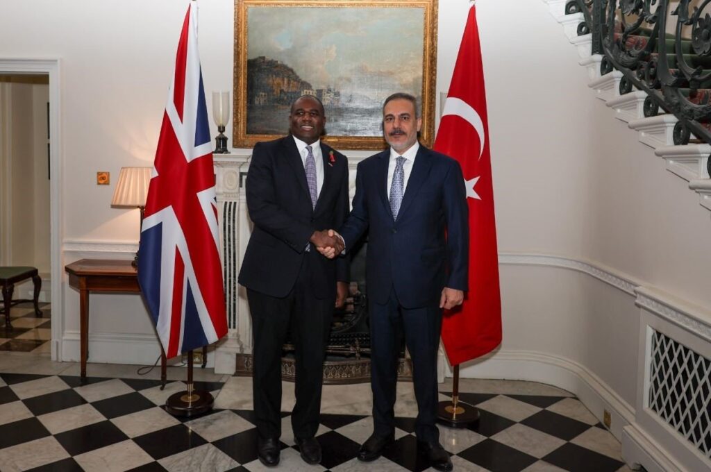 Foreign Minister Hakan Fidan, British Counterpart David Lammy shake hands after a meeting in London, U.K., Oct. 30, 2024. (IHA Photo)