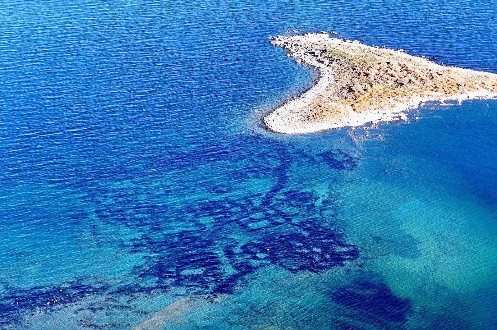 Drone footage captures the remnants of an ancient city's urban layout submerged in Lake Van, Türkiye, Nov. 3, 2024. (IHA Photo)