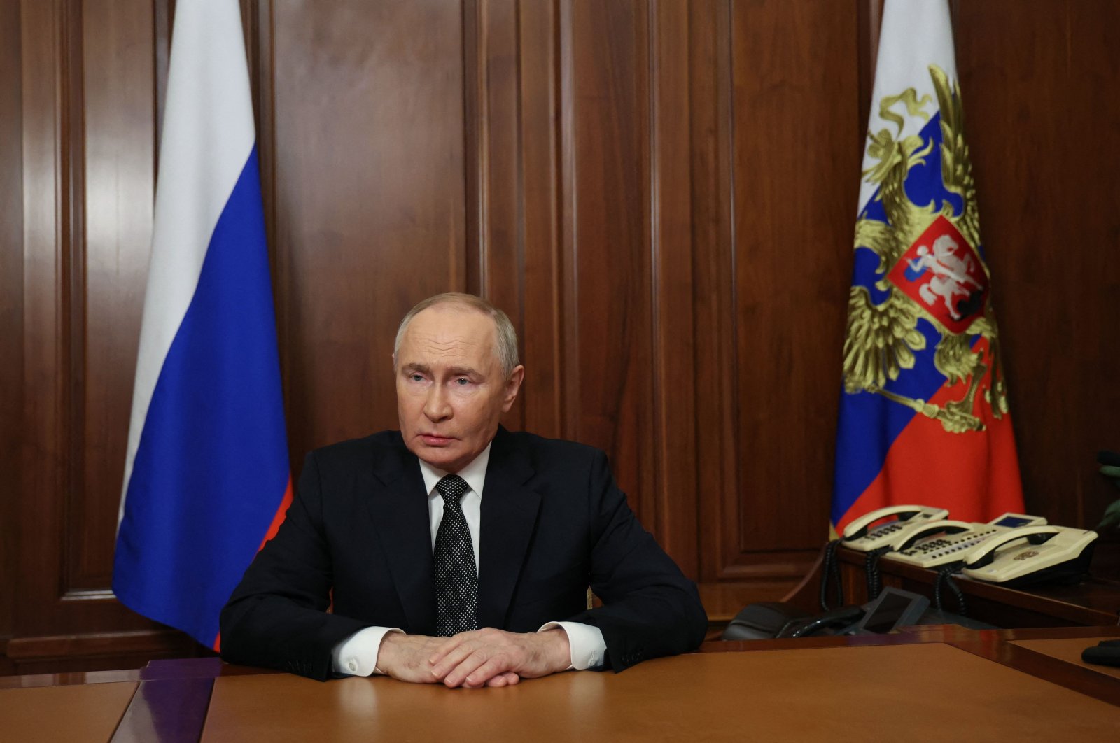 In this pool photograph distributed by the Russian state agency Sputnik, Russia's President Vladimir Putin delivers a televised address to the nation at the Kremlin in Moscow, Nov. 21, 2024. (AFP Photo)