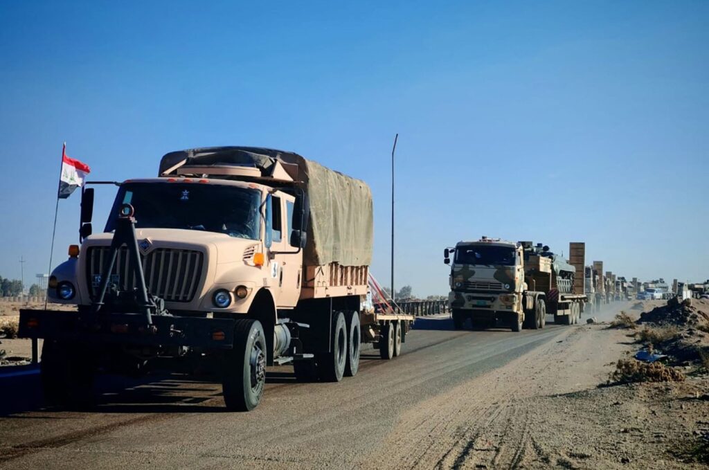 A handout picture released by Iraq's Defense Ministry shows Iraqi military equipment being transported toward the border with Syria on Dec. 2, 2024. (AFP Photo)