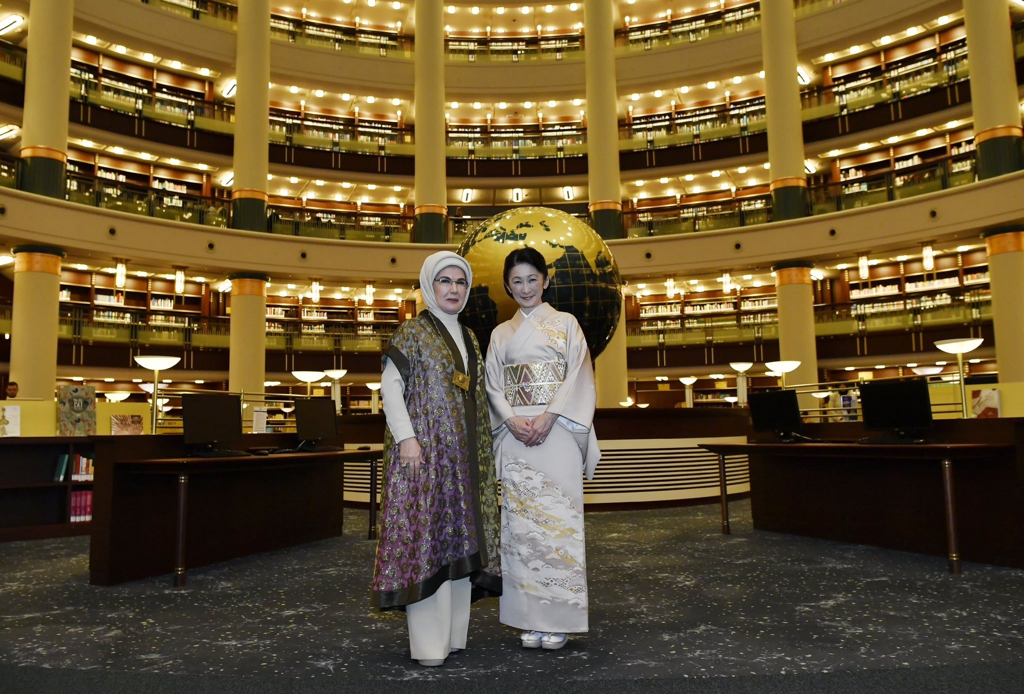 358022 First lady Emine Erdoğan and Japan's Crown Princess Kiko pose for a photo at the Nation's Library in Ankara, Dec. 4, 2024. (DHA Photo)