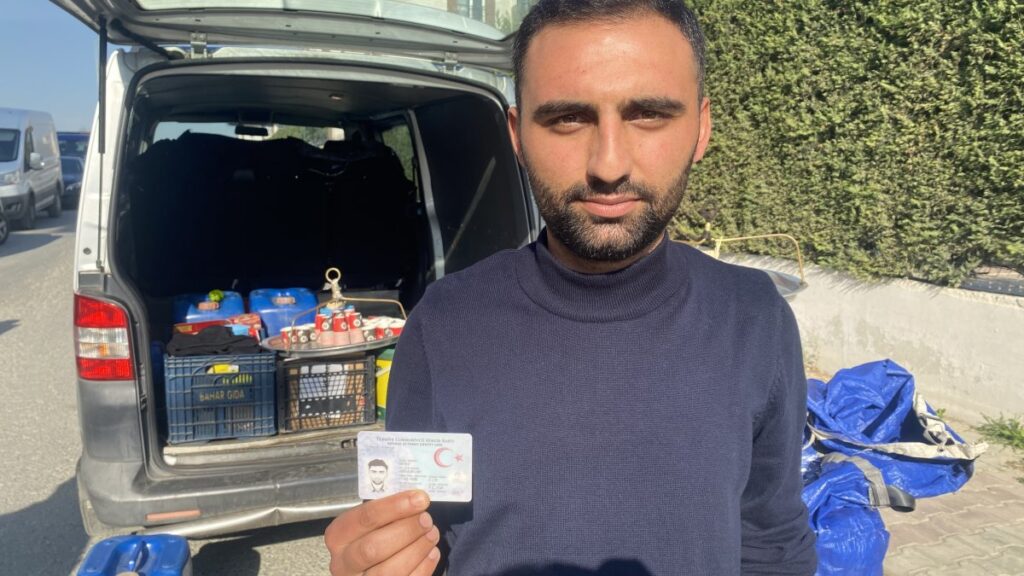 Abdulselam Deniz, a 26-year-old father of two, shows his "too simple" ID card in Büyükçekmece, Istanbul, Türkiye, Nov. 3, 2024. (IHA Photo)