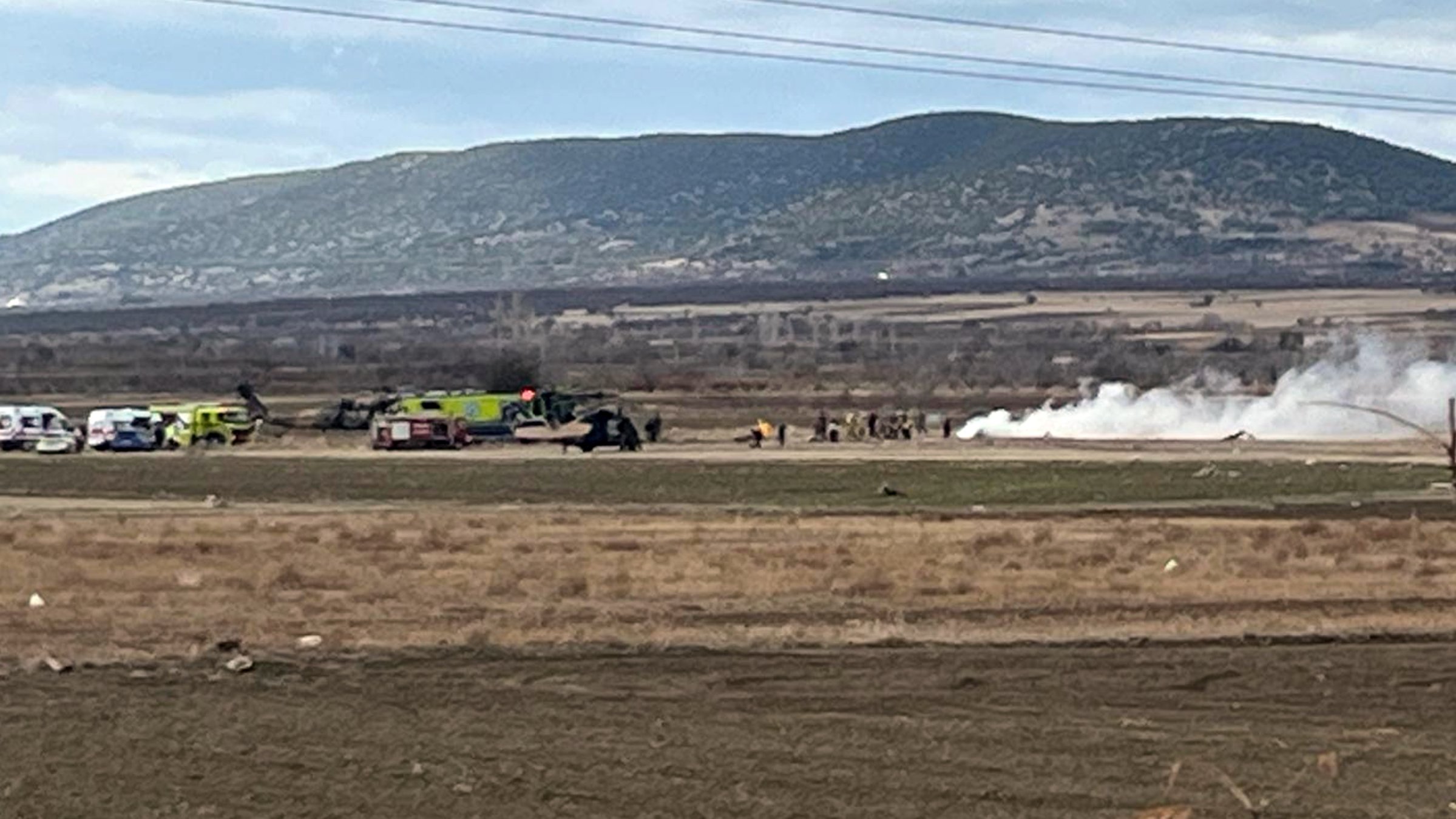 A military helicopter crashes near a gas station in Keçiborlu, Isparta, southwestern Türkiye, Dec. 9, 2024. (DHA Photo)