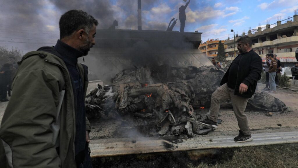 Syrians destroy the statue of Basel Assad, the late elder brother of Syria's Bashar Assad, as they celebrate the fall of capital Damascus to anti-regime forces, Qamishli, Syria, Dec. 8, 2024. (AFP Photo)