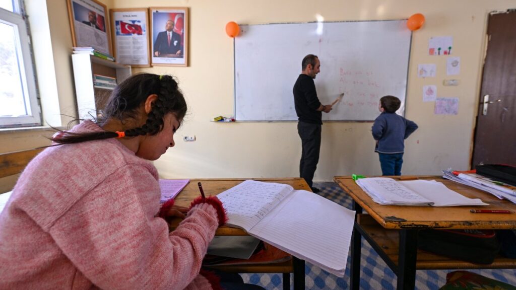 Zilan (F) and Barış (R) attend a class at their school in the Gevaş district of Van, eastern Türkiye, Dec. 10, 2024. (AA Photo)