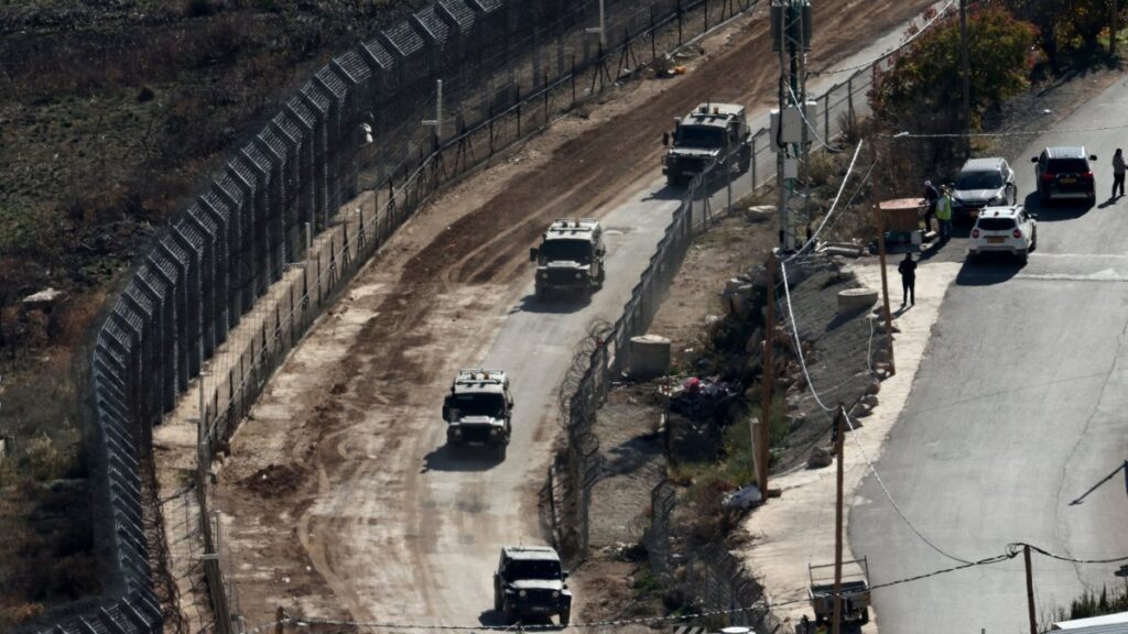 Israeli military vehicles drive toward the Syrian side of the border near the Druze village of Majdal Shams, the occupied Golan Heights, Syria, Dec. 16, 2024. (EPA Photo)