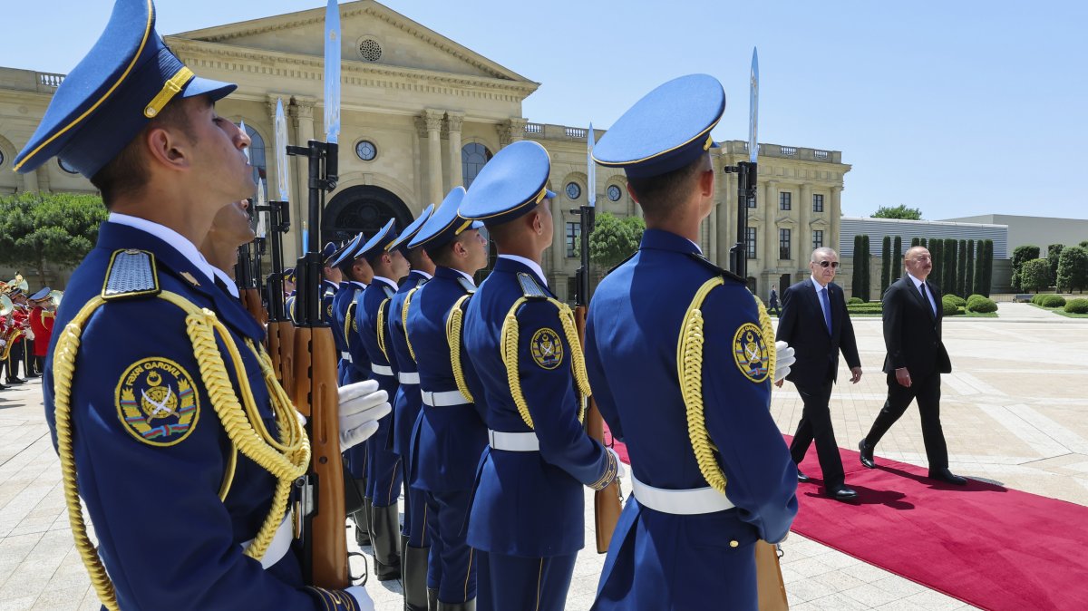 Azerbaijan's President Ilham Aliyev (on carpet R) and President Recep Tayyip Erdoğan (on carpet L) review an honor guard during a welcome ceremony in Baku, Azerbaijan, June 13, 2023. (AP Photo)