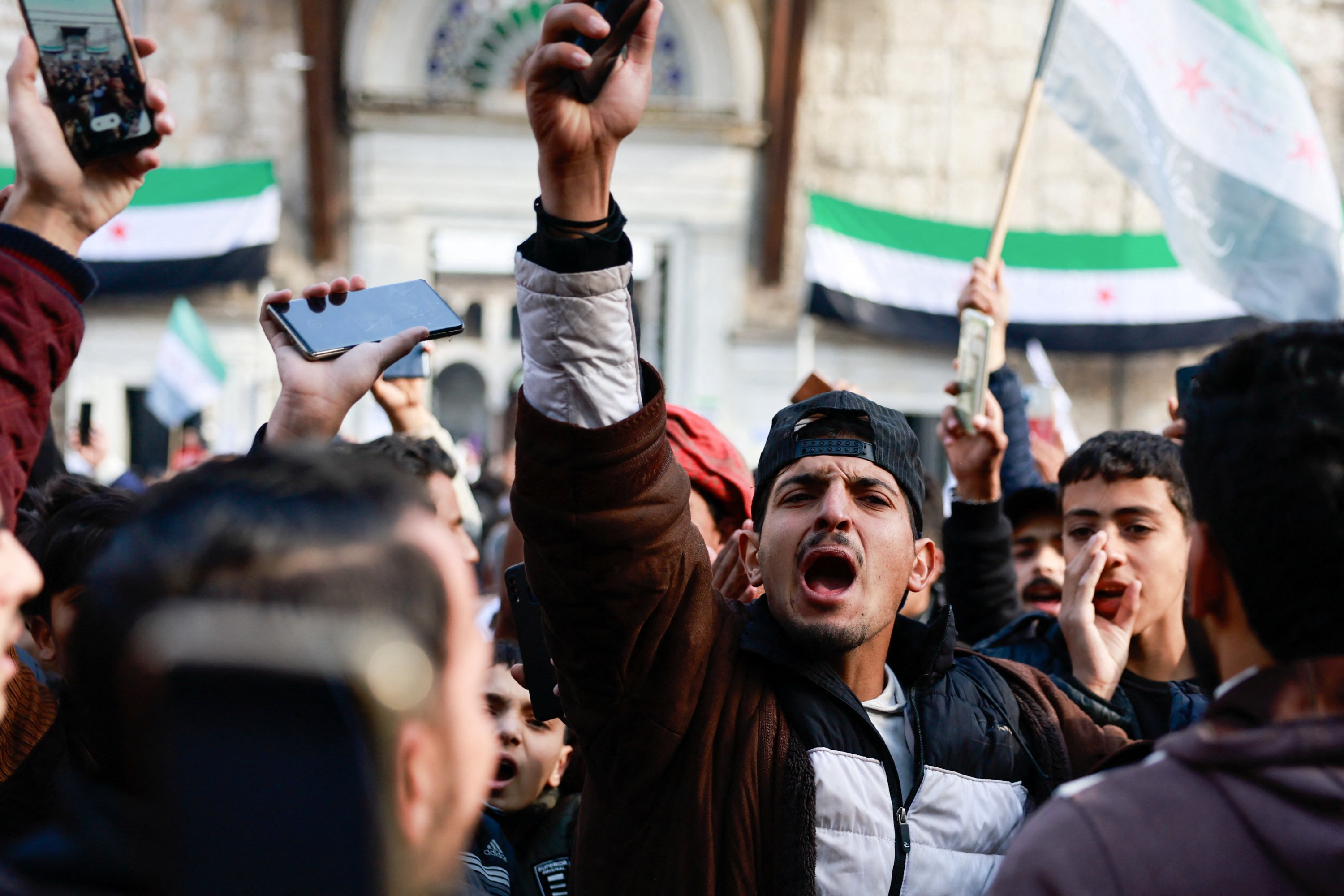 360401 A man celebrates as people attend Friday prayers, after the ousting of Syria's Bashar al-Assad, Damascus, Syria, Dec. 20, 2024. (Reuters Photo)