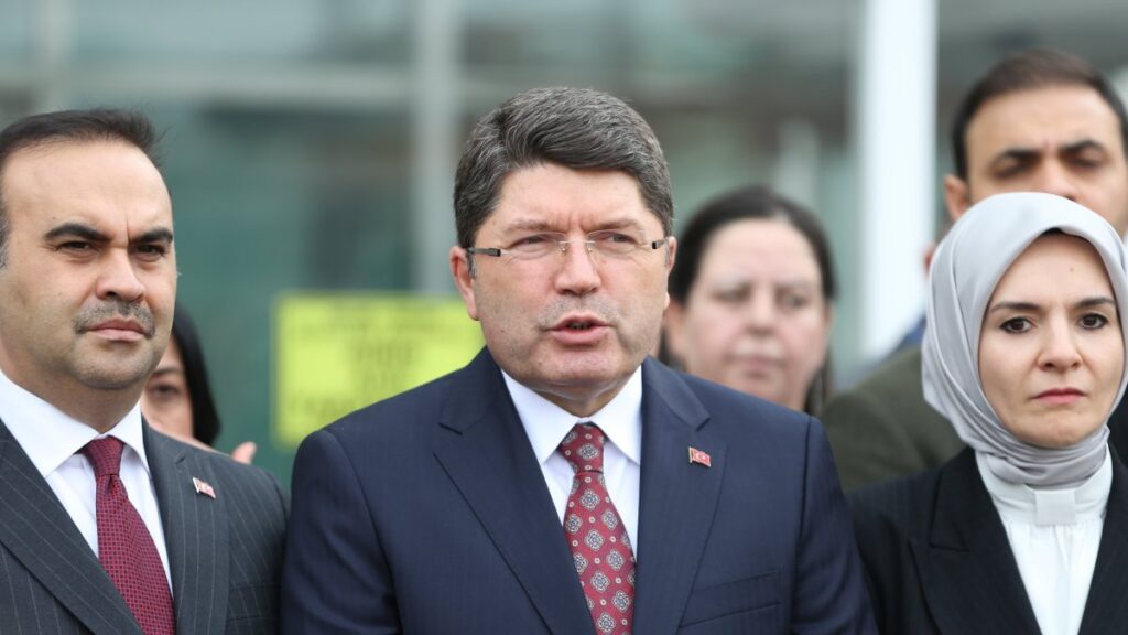 Justice Minister Yılmaz Tunç (center) speaks to reporters in Balıkesir province, Dec. 26, 2024. (AA Photo)