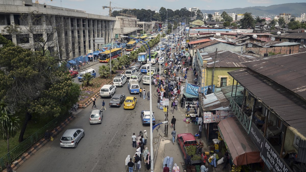 Traffic and pedestrians fill a street in Addis Ababa, Ethiopia, Nov. 3, 2022. (AP Photo)
