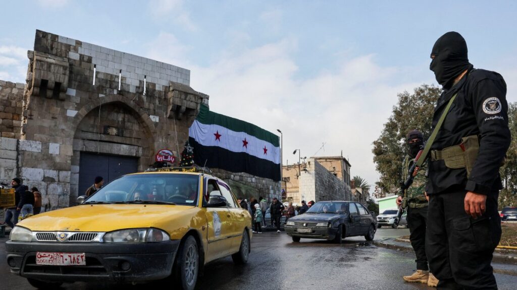 Members of the Syrian Salvation Government stand guard on New Year's Eve at the Bab Touma Square, in Damascus, Syria, Dec. 31, 2024. (Reuters Photo)