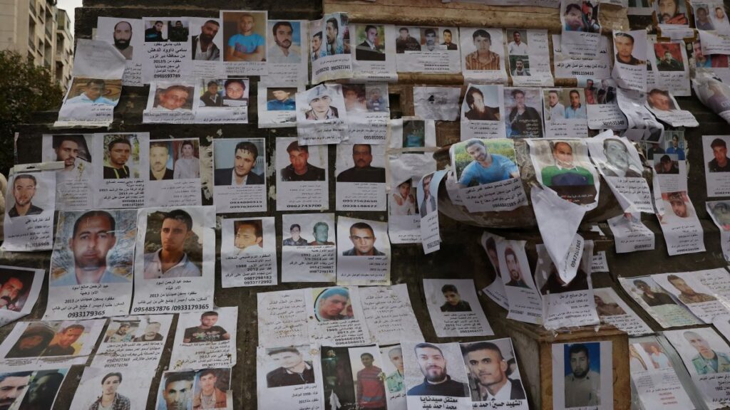 Pictures of missing people believed to be prisoners from Sednaya prison, known as a "slaughterhouse" under Bashar Assad's rule, hang in Marjeh Square, Damascus, Syria, Dec. 22, 2024. (Reuters Photo)