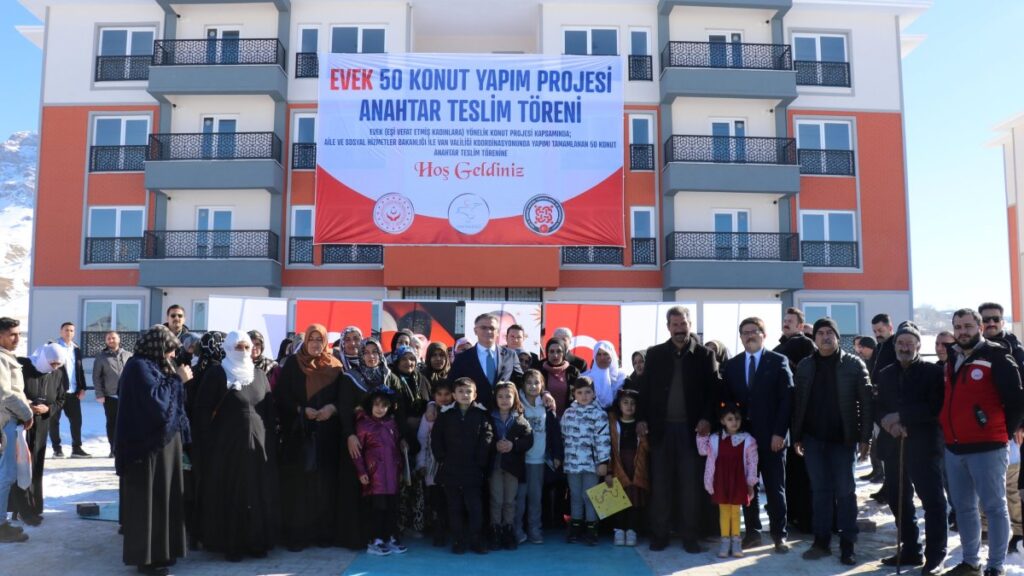 Women receive the keys to their new homes in front of the newly built apartment complex, Van, Türkiye, Jan. 2, 2025. (AA Photo)