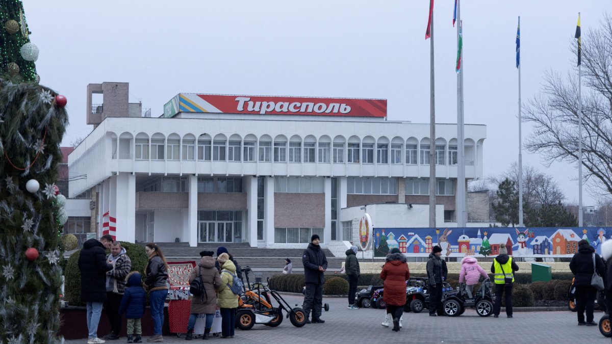People gather near a Christmas tree in a square in Tiraspol, Moldova's breakaway region of Transnistria, Jan. 3, 2025. (Reuters Photo)