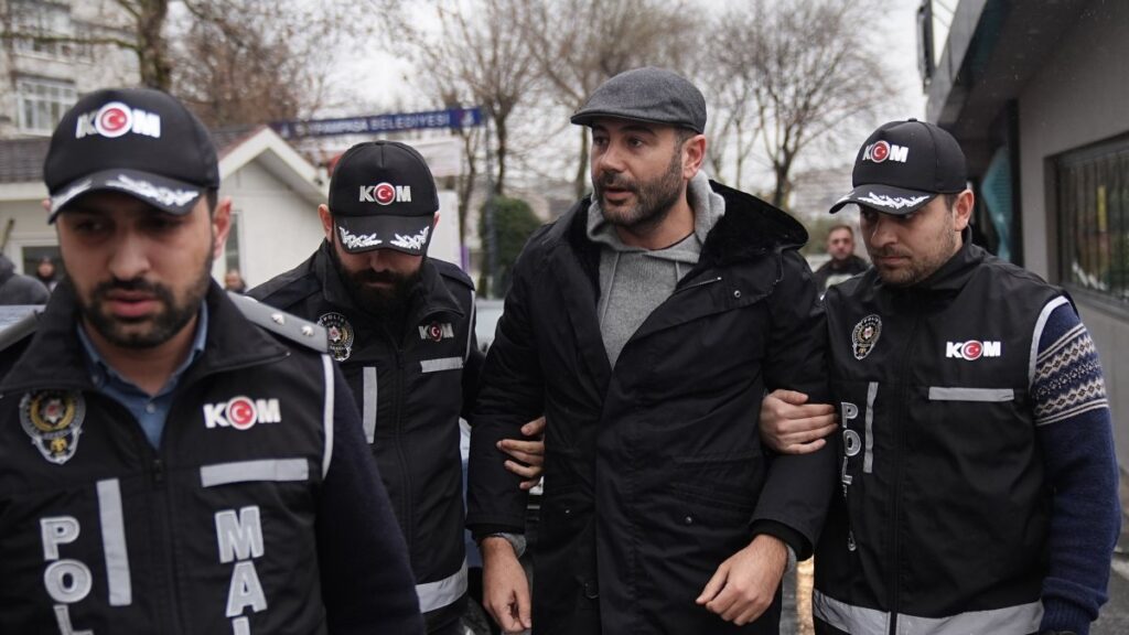 Police officers escort Beşiktaş Mayor Rıza Akpolat, one of the detained as part of the investigation, Istanbul, Türkiye, Jan. 13, 2025. (AA Photo)