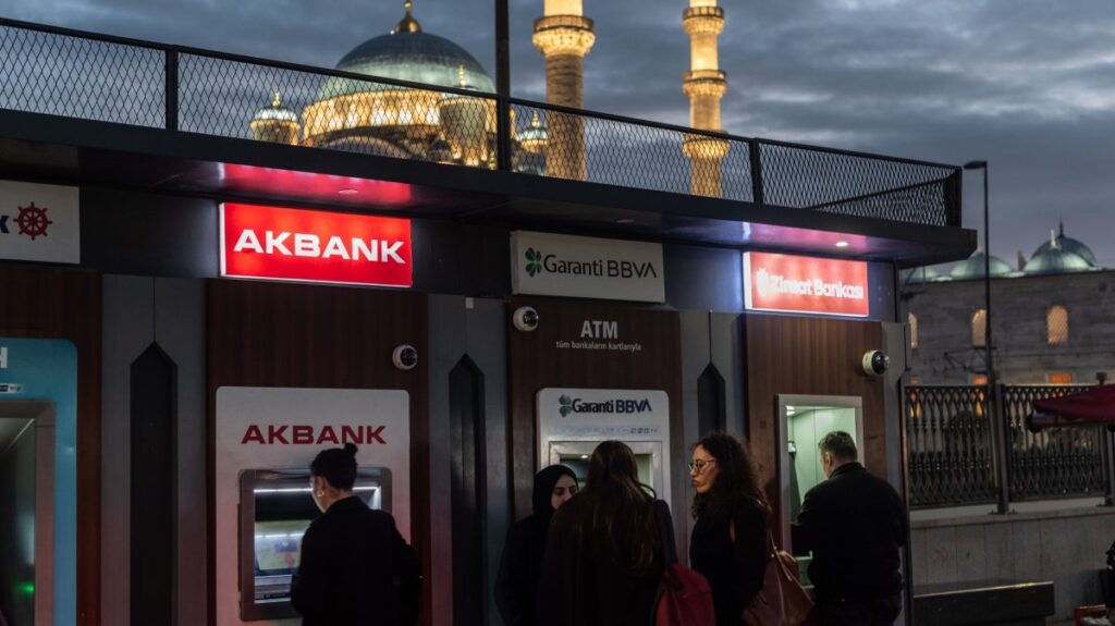 Customers use the Turkish bank ATMs on the European side of Istanbul, Türkiye, Jan. 7, 2025. (Reuters Photo)