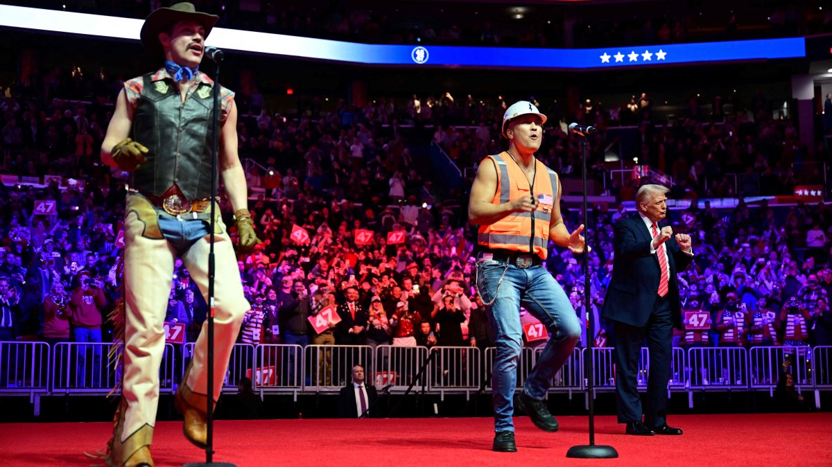 U.S. President-elect Donald Trump (R) dances as the Village People perform at a MAGA victory rally at Capital One Arena in Washington, D.C., U.S., Jan. 19, 2025. (AFP Photo)