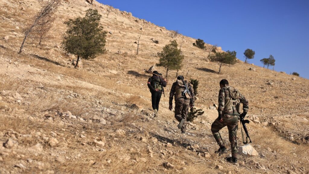 SNA members walk in an area where the army launched an operation against PKK/YPG near Tishrin Dam, Aleppo, Syria, Jan. 17, 2025. (AA Photo)