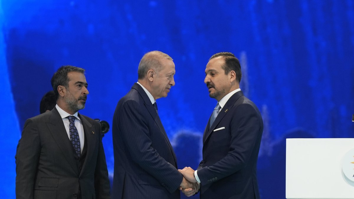 President Recep Tayyip Erdoğan shakes hands with Kürşad Zorlu who joined AK Party from IP, in the capital of Ankara, Türkiye, Jan. 21, 2025. (AA Photo)