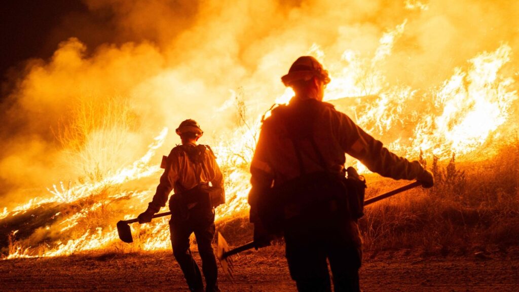 Firefighters work as the Hughes Fire burns in Castaic, California, U.S., Jan. 22, 2025. (AFP Photo)
