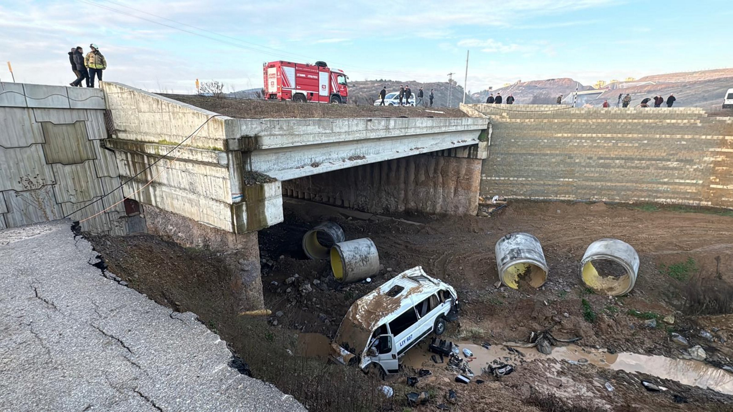 The shuttle bus that fell into a creek bed after the accident, Tuzla, Istanbul, Türkiye, Jan. 24, 2025. (AA Photo)