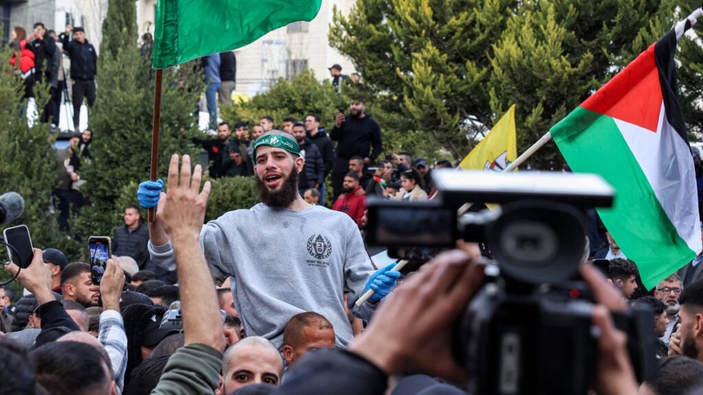 A Palestinian prisoners released by Israel reacts while being carried on people's shoulders in Ramallah, occupied West Bank, Jan. 25, 2025. (AFP Photo)
