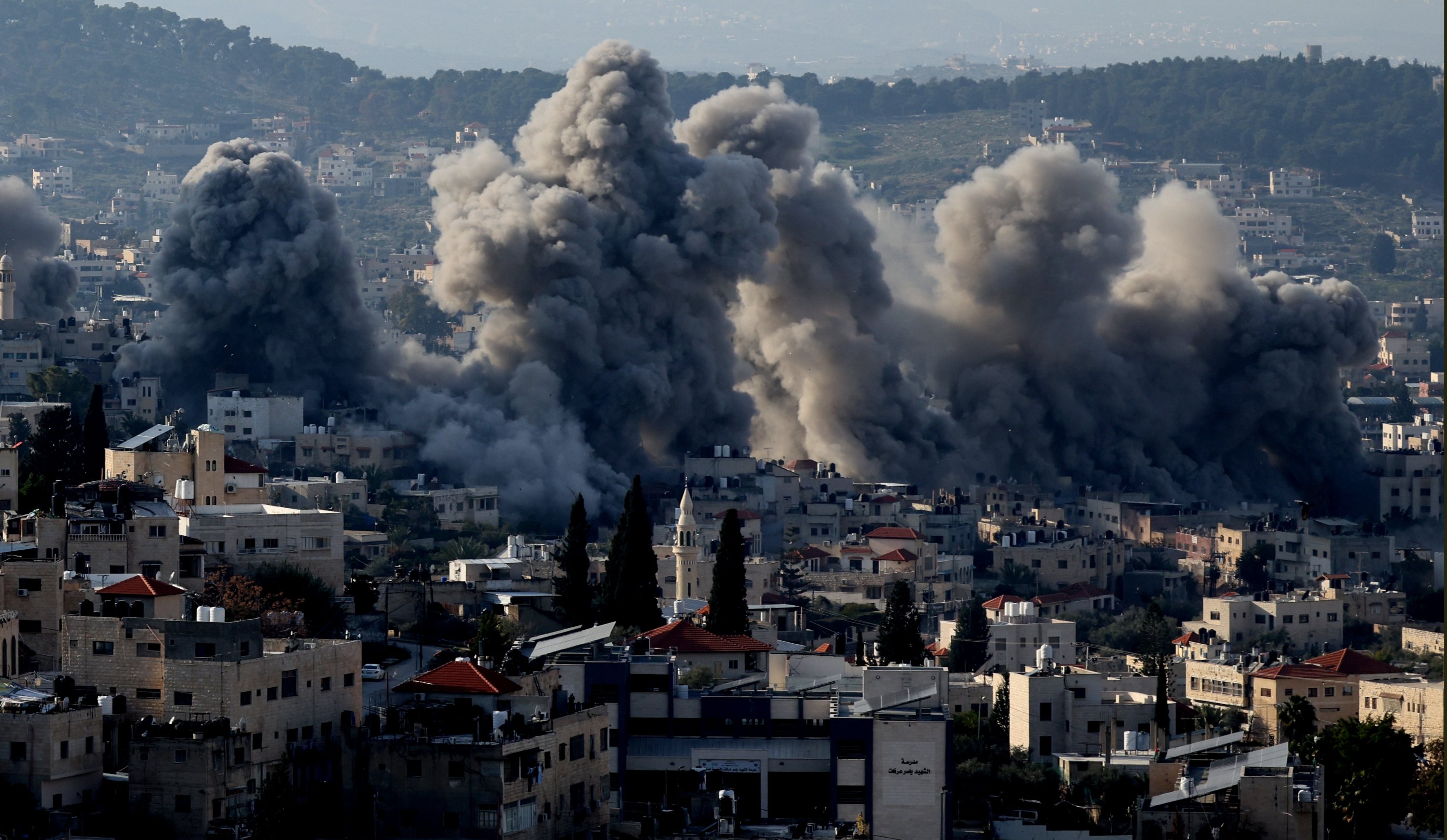 366824 Smoke rises as the Israeli army blows up several buildings in a residential area in Jenin, occupied West Bank, Palestine, Feb. 2, 2025. (EPA Photo)