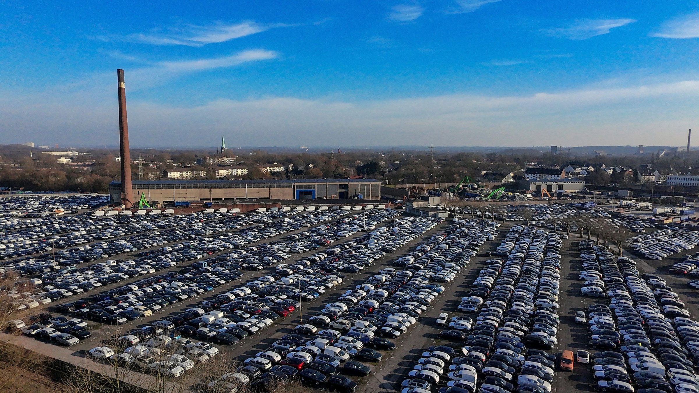 An aerial drone view of numerous new cars parked at a car logistics terminal, Essen, Germany, Feb. 3, 2025. (EPA Photo)