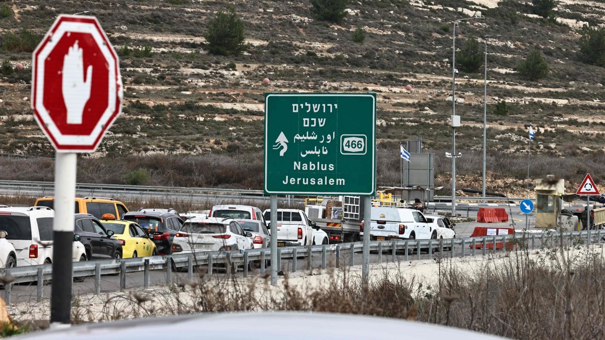 Commuters wait in their vehicles at the Israeli Atara checkpoint on route 465 near Ramallah in the occupied West Bank, Palestine, Jan. 22, 2025. (AFP Photo)