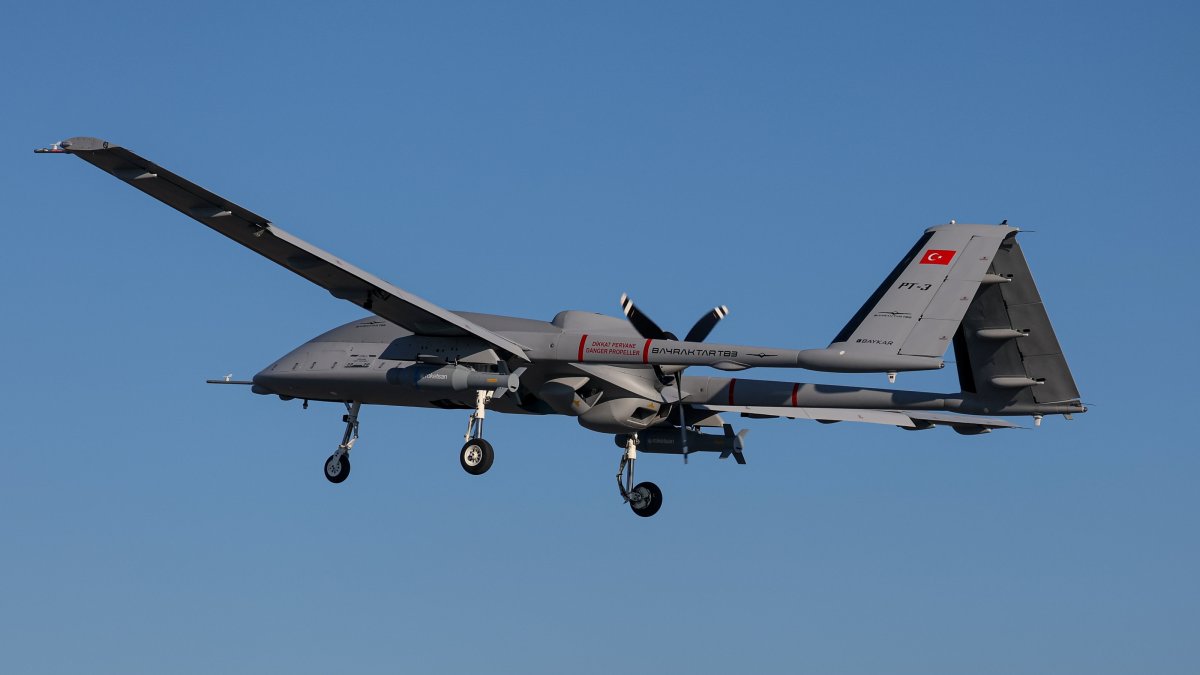 The Bayraktar TB3 UAV, developed by Turkish defense company Baykar is seen during a test flight, armed with Roketsan's MAM-T ammunition, Türkiye, Jan. 18, 2025. (AA Photo)