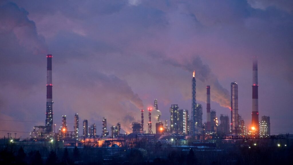 Flue gas and steam rise out of chimneys and smokestacks of an oil refinery during sunset on a frosty day in the Siberian city of Omsk, Russia, Feb. 8, 2023. (Reuters Photo)