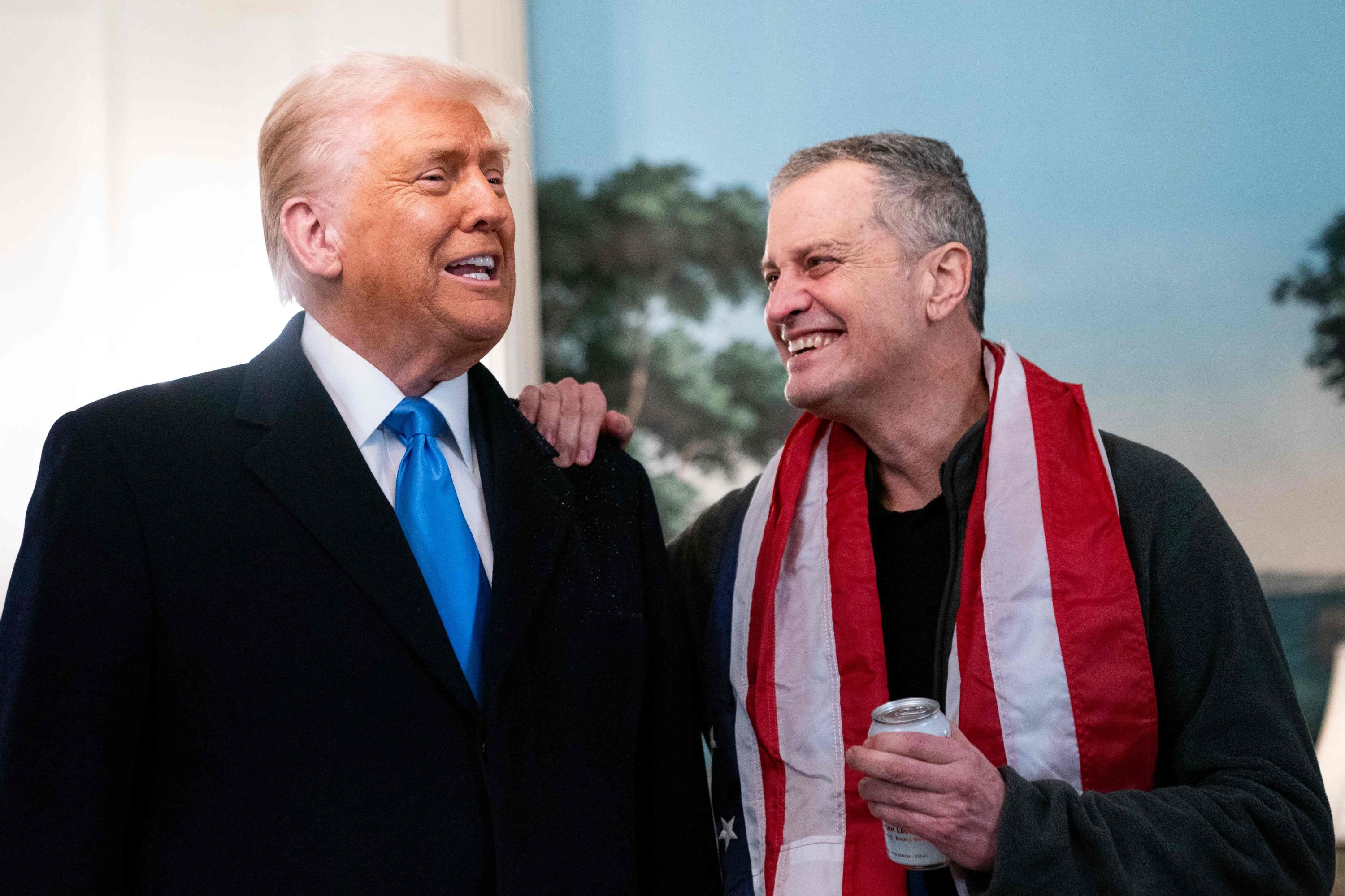 368153 U.S. President Donald Trump (L) welcomes former detainee Marc Fogel to the White House after he was freed from Russia in Washington, D.C., U.S., Feb. 11, 2025. (AFP Photo)