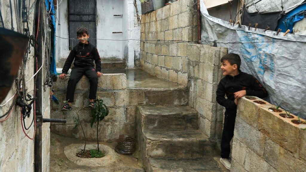 Children play in an alley in the camp of Atme for displaced people, on the outskirts of Idlib in northwestern Syria, Feb. 5, 2025. (AFP Photo)