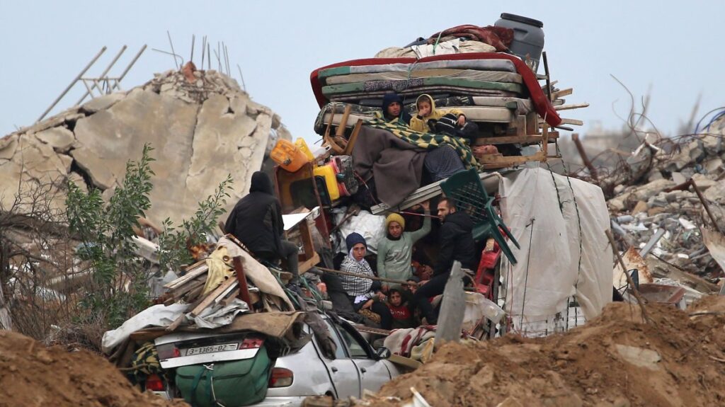 Palestinians drive with their belongings on Salah al-Din road in al-Mughraqa in the central Gaza Strip, Palestine, Feb. 13, 2025. (AFP Photo)