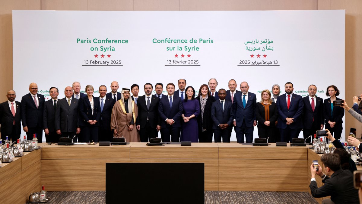 France's President Emmanuel Macron, Syria's Minister of Foreign Affairs Asaad Hassan al-Shaibani and participants pose for a family photograph during the International Conference on Syria in Paris, France Feb. 13, 2025. (Reuters Photo)