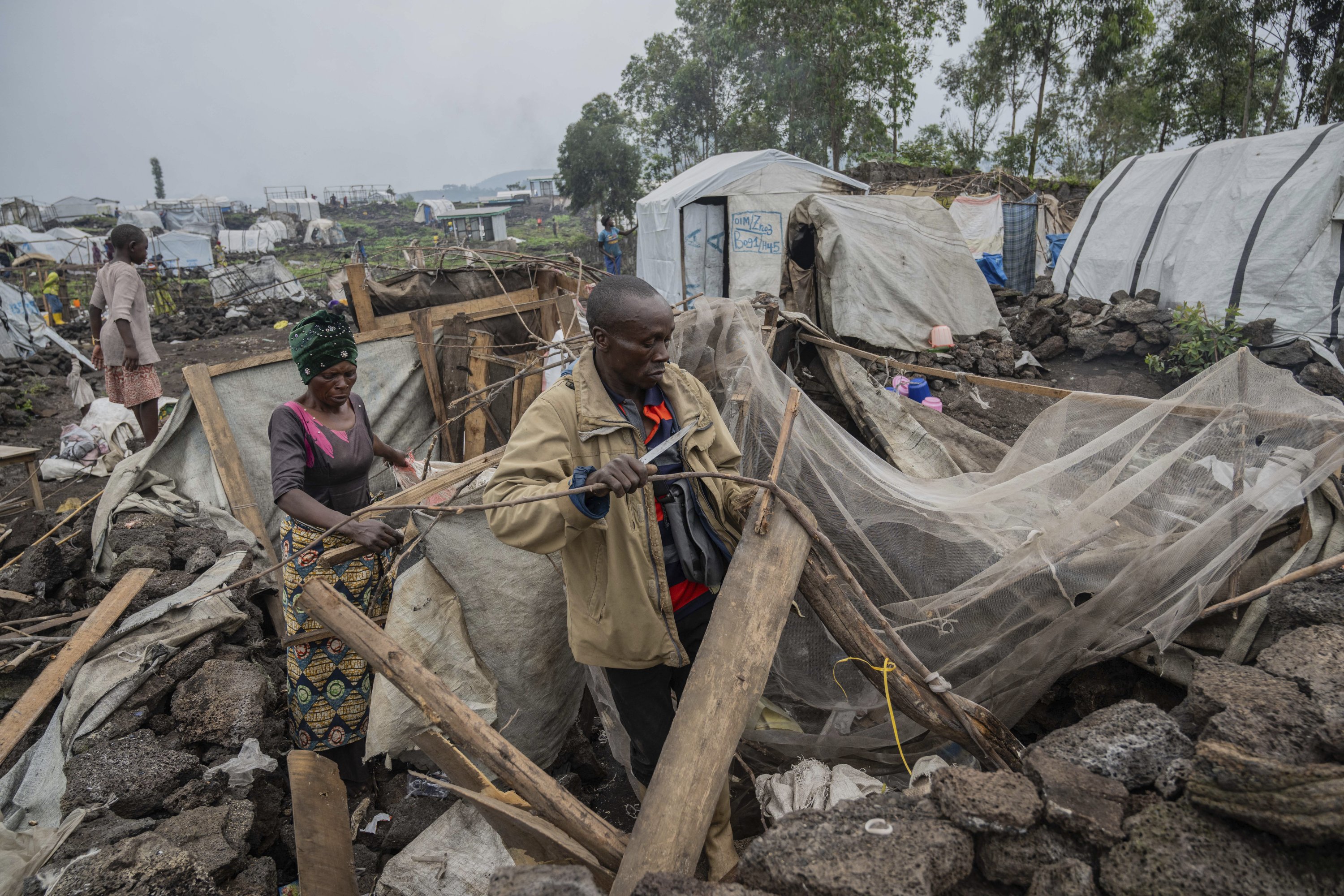 368576 People who were displaced by the fighting between M23 rebels and government soldiers prepare to leave their camp following an instruction by M23 rebels, Goma, DRC, Feb. 11, 2025. (AP Photo)